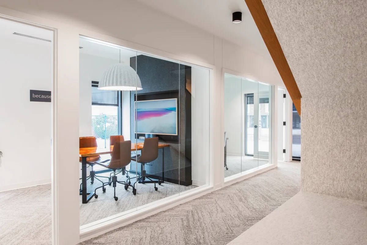 Modern office interior with a glass-walled conference room, 4019 Ingersoll, Des Moines