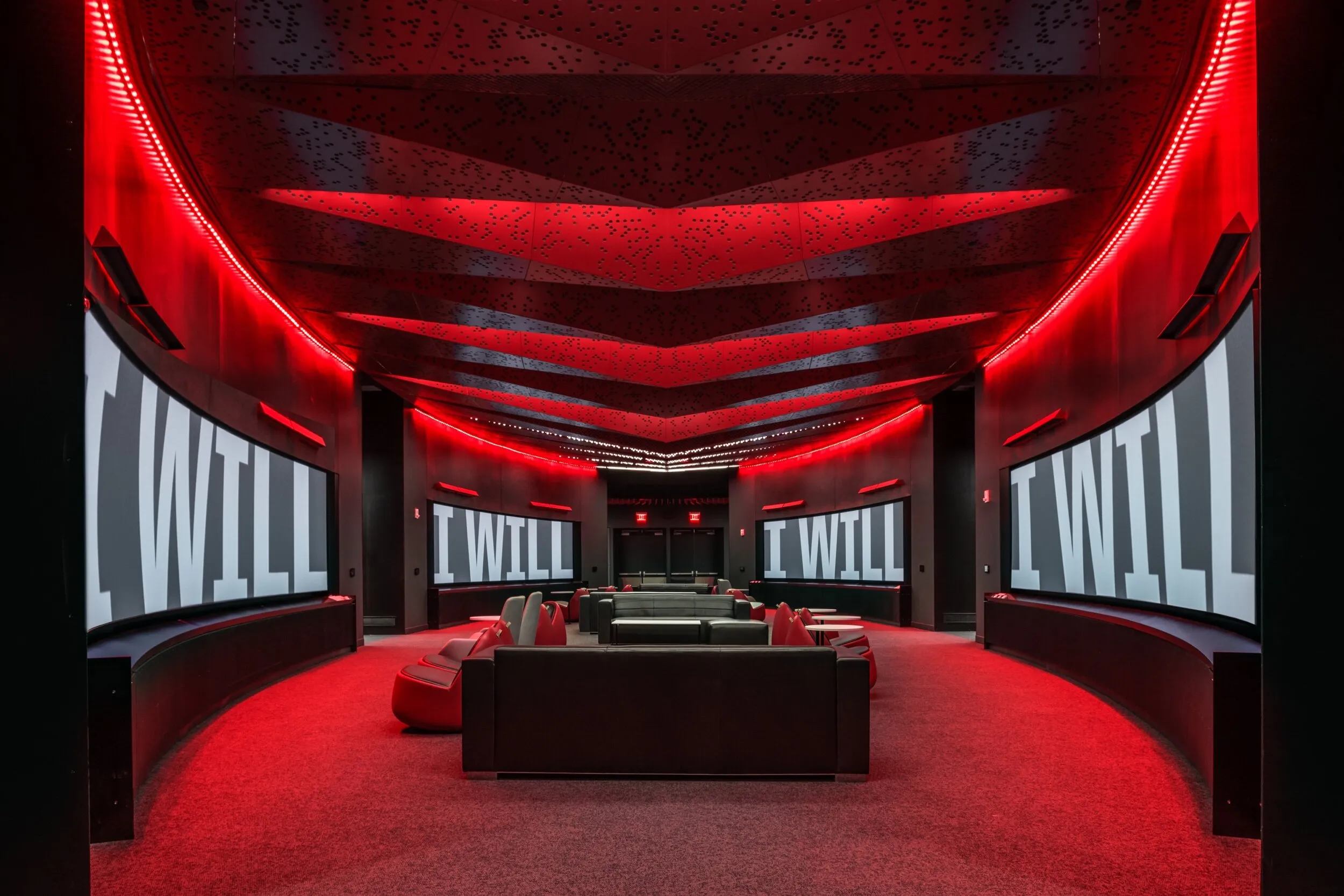 Stark Performance Center locker room lit in red