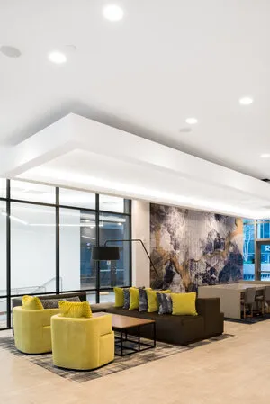 RISE lounge with yellow seating